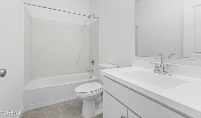 full bathroom featuring tile patterned floors, toilet, vanity, and tiled shower / bath