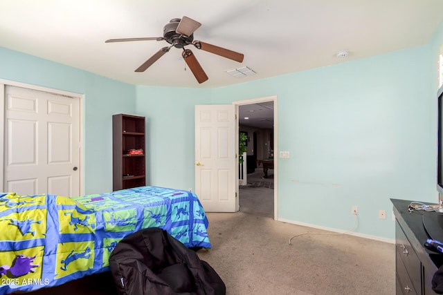 carpeted bedroom with visible vents, baseboards, and ceiling fan