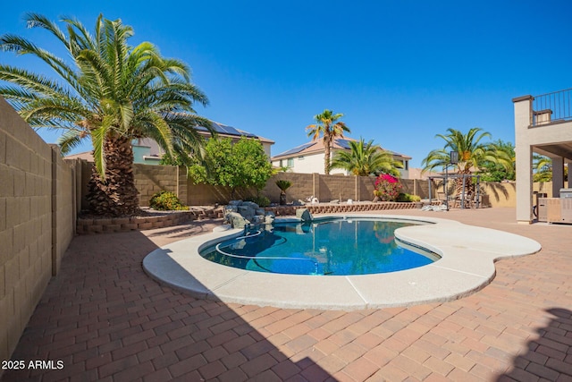 view of pool featuring a patio area, a fenced backyard, and a fenced in pool