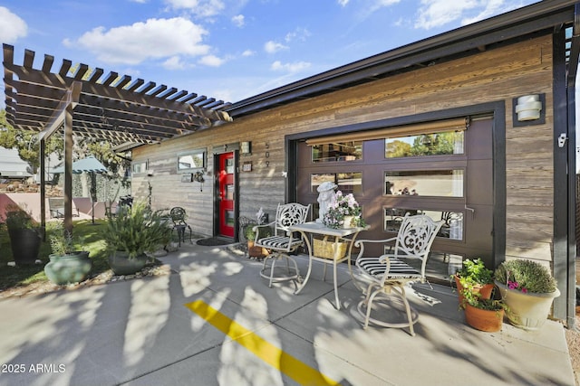 view of patio featuring a pergola