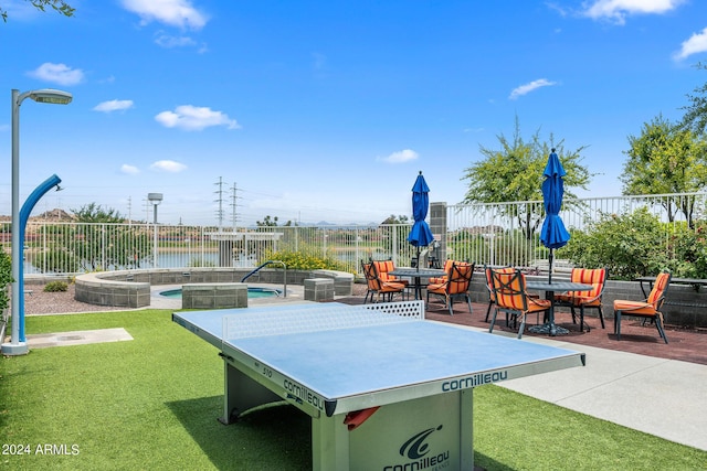 view of patio / terrace with a water view