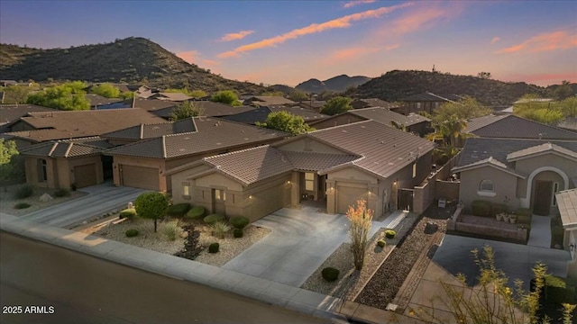 aerial view with a mountain view and a residential view