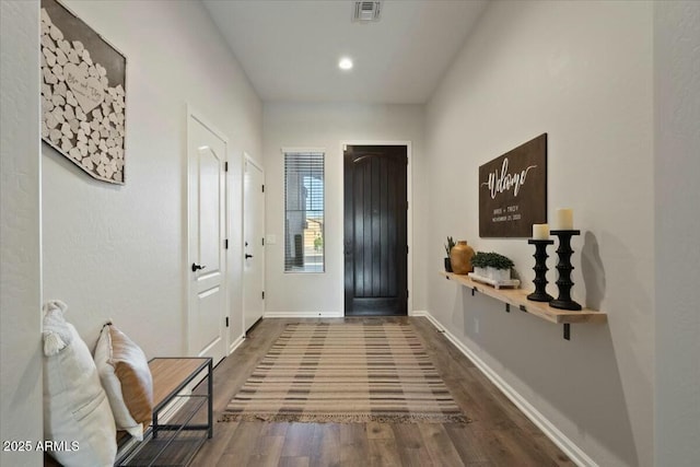 entrance foyer featuring wood finished floors, baseboards, visible vents, and recessed lighting