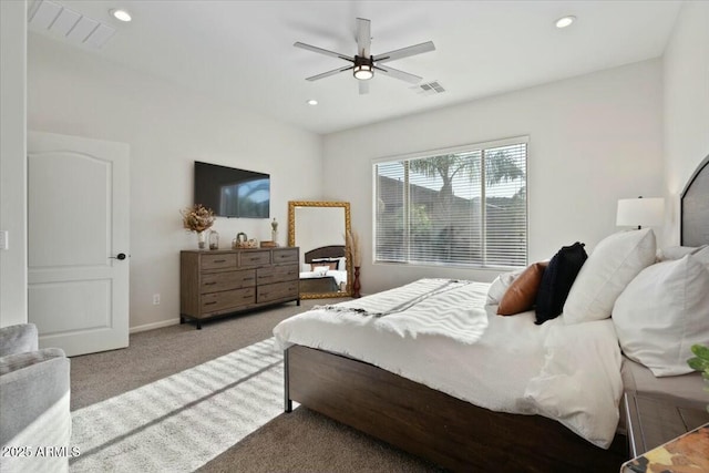 carpeted bedroom featuring visible vents, baseboards, recessed lighting, and a ceiling fan