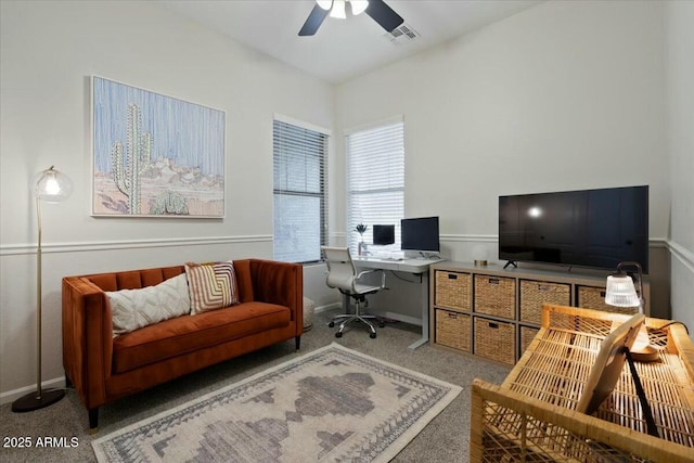 home office featuring carpet flooring, visible vents, baseboards, and ceiling fan