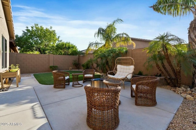 view of patio featuring a fenced backyard