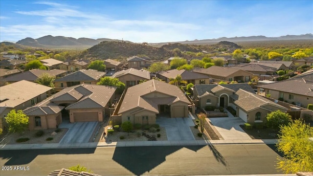 aerial view with a mountain view and a residential view