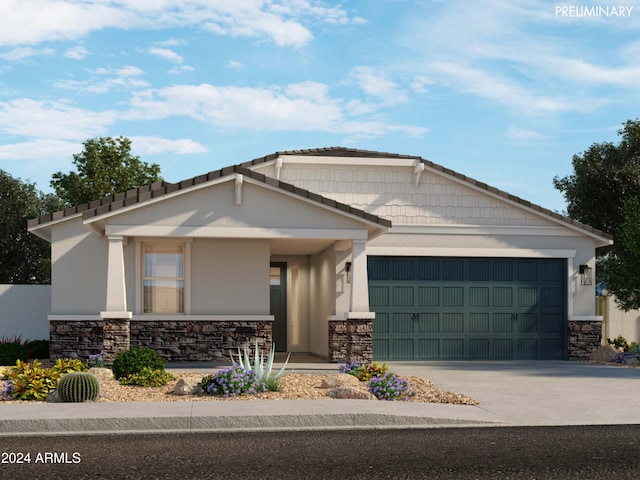 view of front of home featuring driveway, stone siding, an attached garage, and stucco siding