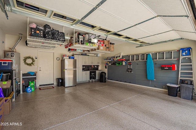 5735 S Cloverdale Ln, Gilbert, AZ 85298 - garage featuring freestanding refrigerator