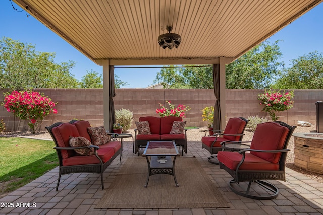 5735 S Cloverdale Ln, Gilbert, AZ 85298 - fenced backyard with outdoor lounge area and a patio area