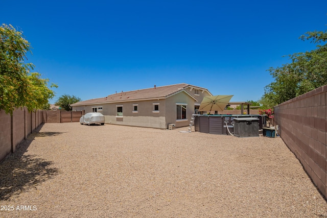 5735 S Cloverdale Ln, Gilbert, AZ 85298 - back of property with a fenced backyard and stucco siding