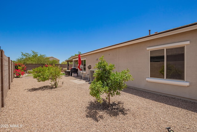 5735 S Cloverdale Ln, Gilbert, AZ 85298 - fenced backyard featuring a patio area