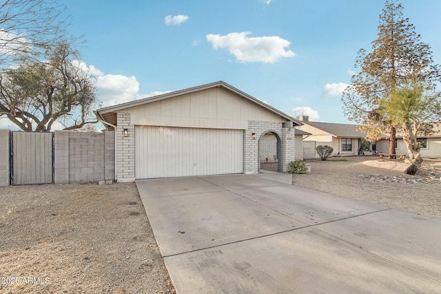 ranch-style home with a garage