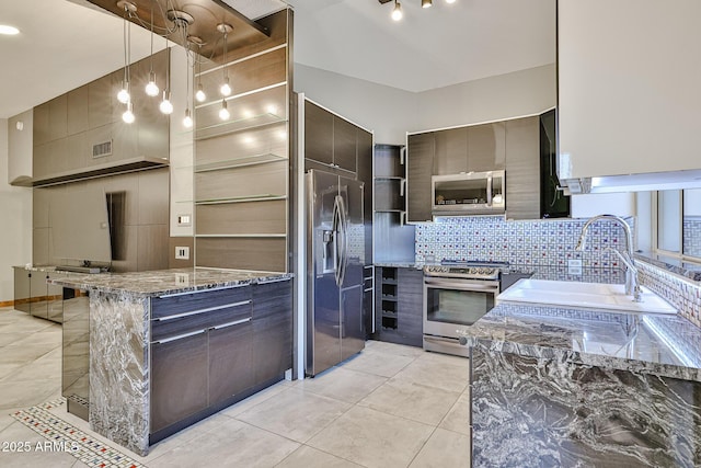 17421 N 14th St, Phoenix, AZ 85022 - kitchen with appliances with stainless steel finishes, backsplash, modern cabinets, light tile patterned flooring, and stone countertops