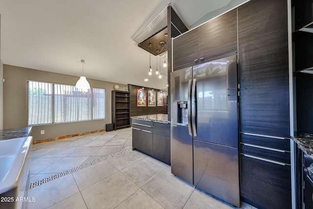 17421 N 14th St, Phoenix, AZ 85022 - kitchen featuring stainless steel refrigerator with ice dispenser, light tile patterned floors, baseboards, pendant lighting, and dark brown cabinets