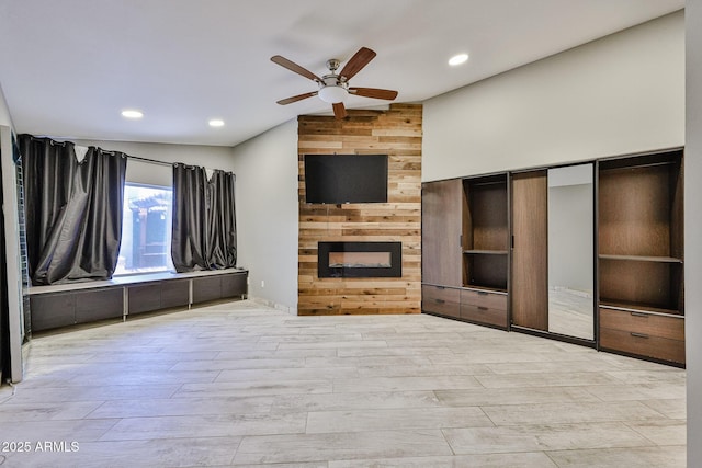 17421 N 14th St, Phoenix, AZ 85022 - unfurnished living room featuring vaulted ceiling, a ceiling fan, a fireplace, wood finished floors, and recessed lighting
