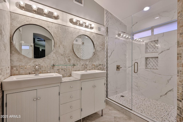 17421 N 14th St, Phoenix, AZ 85022 - full bath with a marble finish shower, double vanity, tile walls, and tasteful backsplash