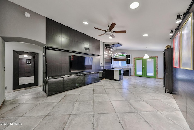 17421 N 14th St, Phoenix, AZ 85022 - unfurnished living room with a ceiling fan, recessed lighting, arched walkways, and light tile patterned flooring