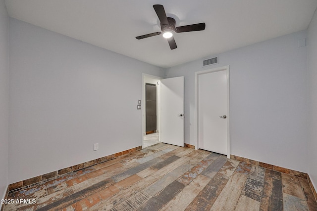 17421 N 14th St, Phoenix, AZ 85022 - unfurnished bedroom featuring light wood-style flooring, baseboards, and ceiling fan