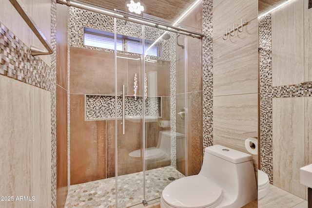 17421 N 14th St, Phoenix, AZ 85022 - full bathroom featuring toilet, tile walls, and a shower stall
