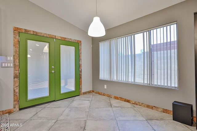 17421 N 14th St, Phoenix, AZ 85022 - unfurnished dining area featuring baseboards, lofted ceiling, and french doors