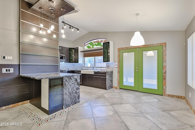 17421 N 14th St, Phoenix, AZ 85022 - kitchen featuring lofted ceiling, beverage cooler, backsplash, stone countertops, and french doors