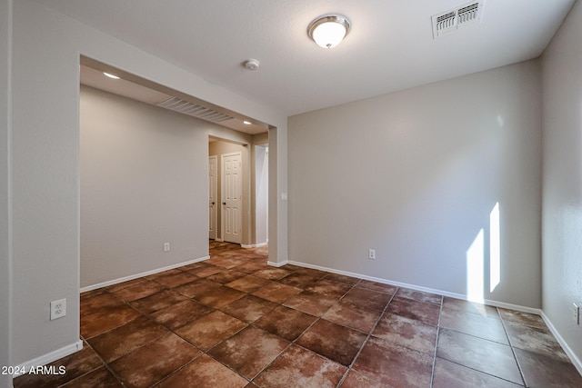41208 W Bravo Dr, Maricopa, AZ 85138 - spare room featuring a smoke detector and baseboards
