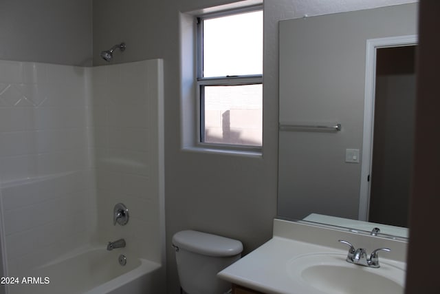 full bathroom featuring vanity, shower / bath combination, and toilet