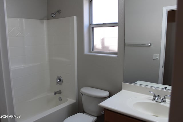 full bathroom with shower / bathing tub combination, vanity, and toilet