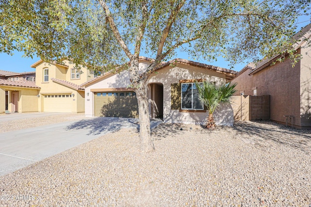 41208 W Bravo Dr, Maricopa, AZ 85138 - mediterranean / spanish-style house with stucco siding and driveway