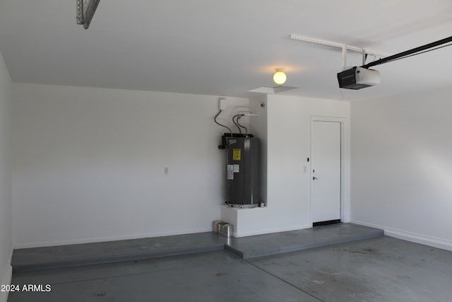 garage featuring a garage door opener and water heater