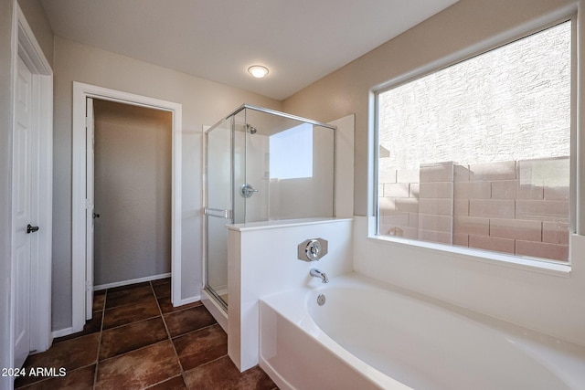 41208 W Bravo Dr, Maricopa, AZ 85138 - bathroom featuring a shower stall, a garden tub, and tile patterned flooring