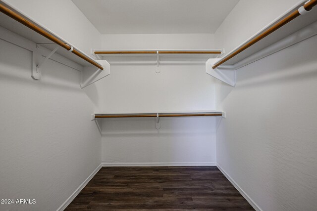 41208 W Bravo Dr, Maricopa, AZ 85138 - walk in closet with wood finished floors