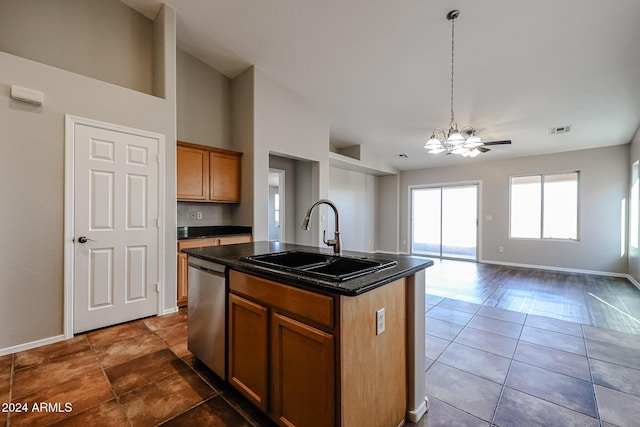 41208 W Bravo Dr, Maricopa, AZ 85138 - kitchen featuring a sink, dishwasher, a chandelier, a center island with sink, and open floor plan