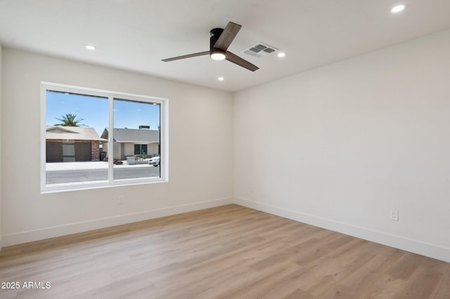 unfurnished room with light wood-type flooring, ceiling fan, recessed lighting, and baseboards