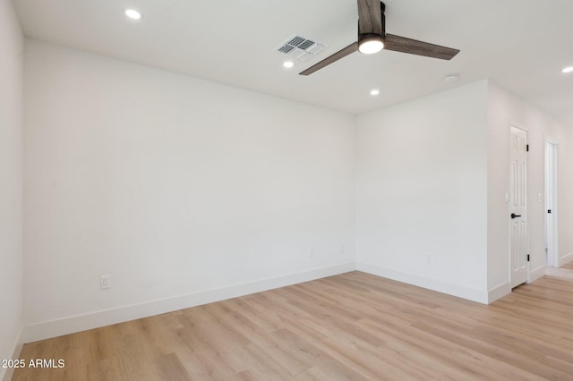 unfurnished room with light wood finished floors, recessed lighting, baseboards, and a ceiling fan