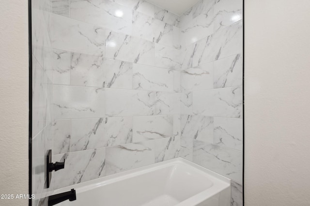 bathroom with shower / washtub combination
