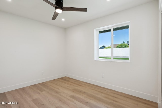 unfurnished room with baseboards, light wood-style flooring, recessed lighting, and ceiling fan