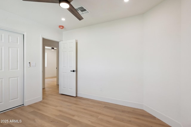 unfurnished bedroom with light wood-style floors, baseboards, recessed lighting, and a ceiling fan