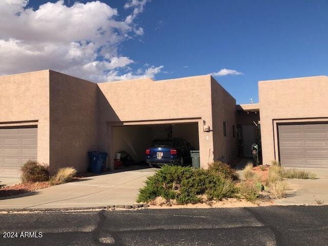 exterior space with a garage