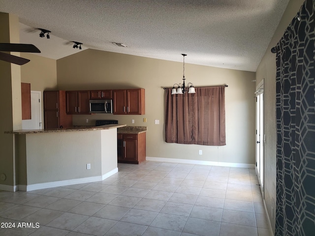 kitchen with a textured ceiling, light tile patterned flooring, a notable chandelier, vaulted ceiling, and kitchen peninsula