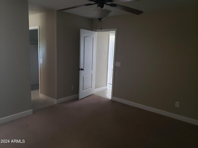 spare room with ceiling fan