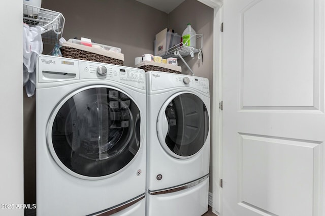 laundry area featuring laundry area and washing machine and dryer