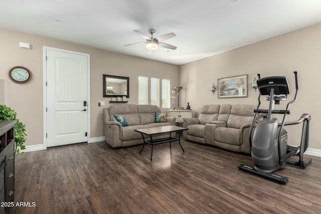 living area with ceiling fan, wood finished floors, and baseboards