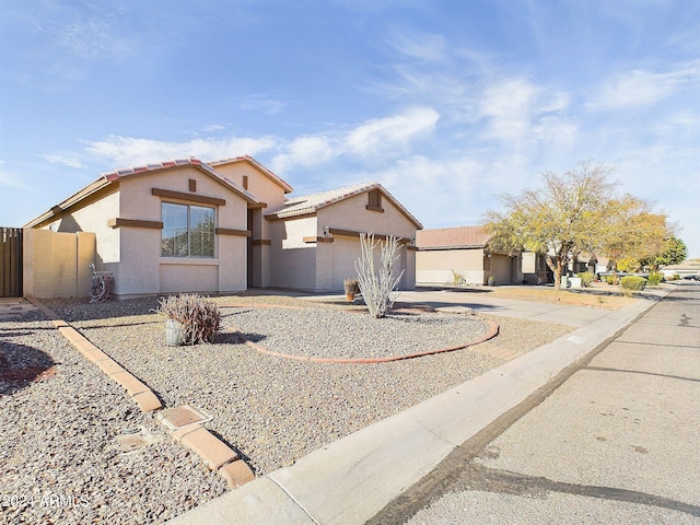 view of front of property with a garage