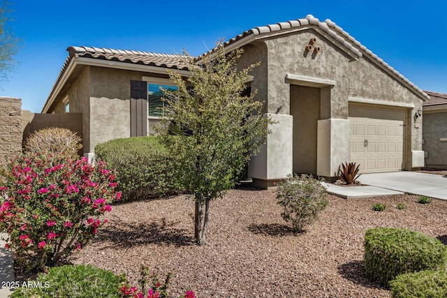 10454 W Maya Way, Peoria, AZ 85383 - view of front facade featuring stucco siding, driveway, a garage, and a tiled roof