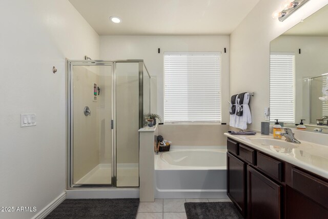 10454 W Maya Way, Peoria, AZ 85383 - full bathroom with a shower stall, a bath, tile patterned flooring, and vanity