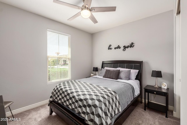 10454 W Maya Way, Peoria, AZ 85383 - carpeted bedroom with baseboards and ceiling fan