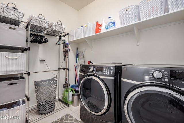 10454 W Maya Way, Peoria, AZ 85383 - clothes washing area with washer and clothes dryer, laundry area, and tile patterned flooring