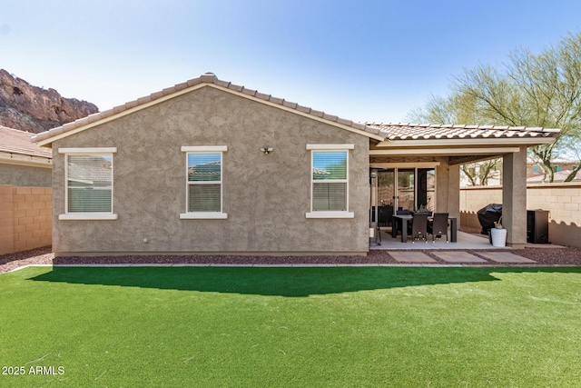10454 W Maya Way, Peoria, AZ 85383 - back of house with a yard, stucco siding, fence, and a patio area